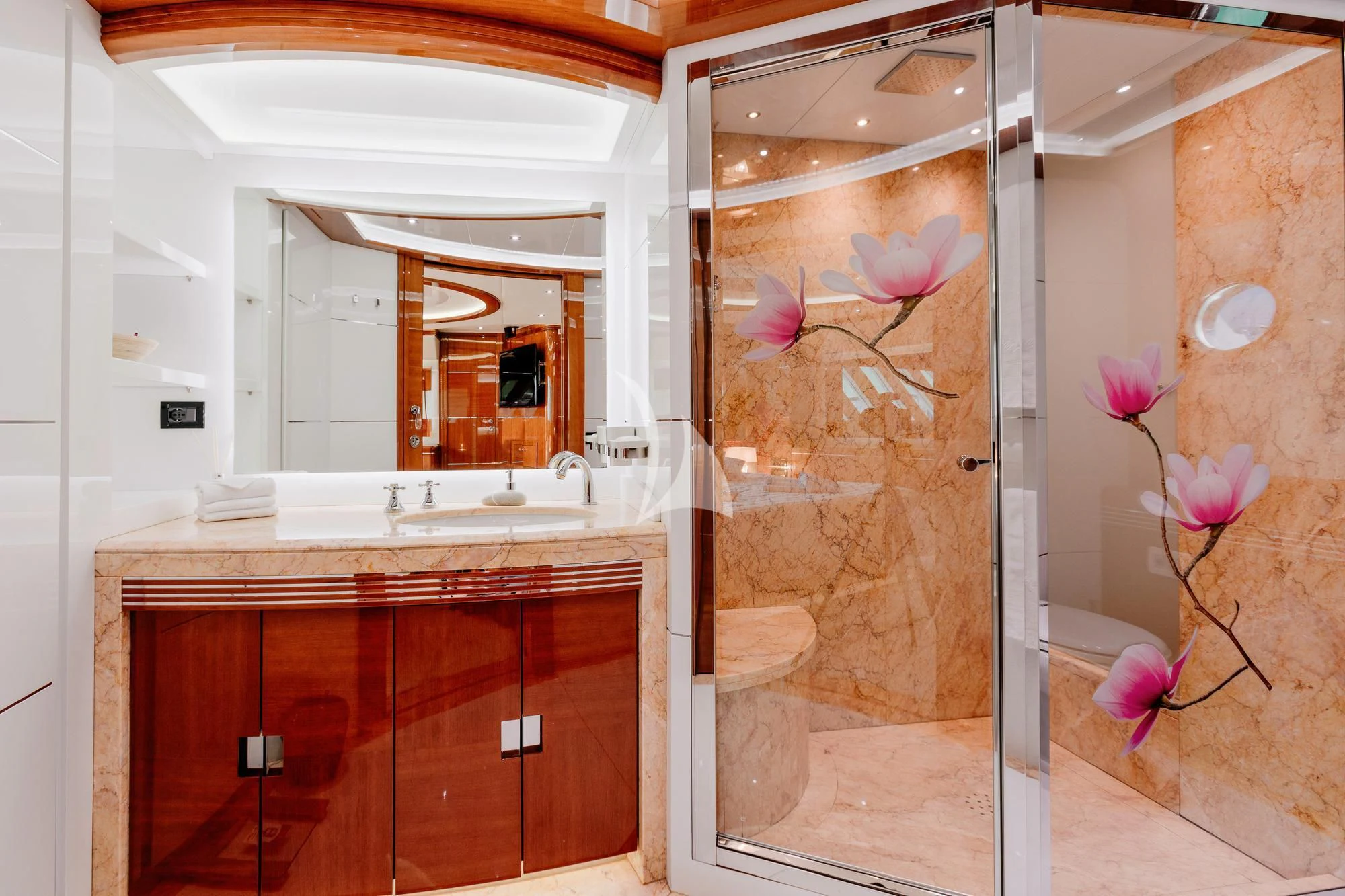 a bathroom with a glass shower aboard LADY MURA Yacht for Sale