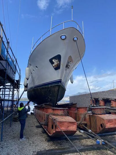a large metal object with a person standing next to it aboard MI AMOR Yacht for Sale