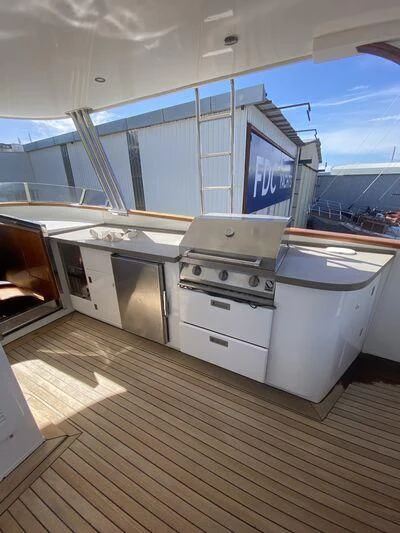 a kitchen with a large window aboard MI AMOR Yacht for Sale