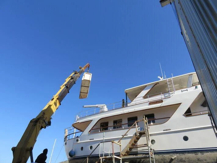a boat docked at a pier aboard MI AMOR Yacht for Sale