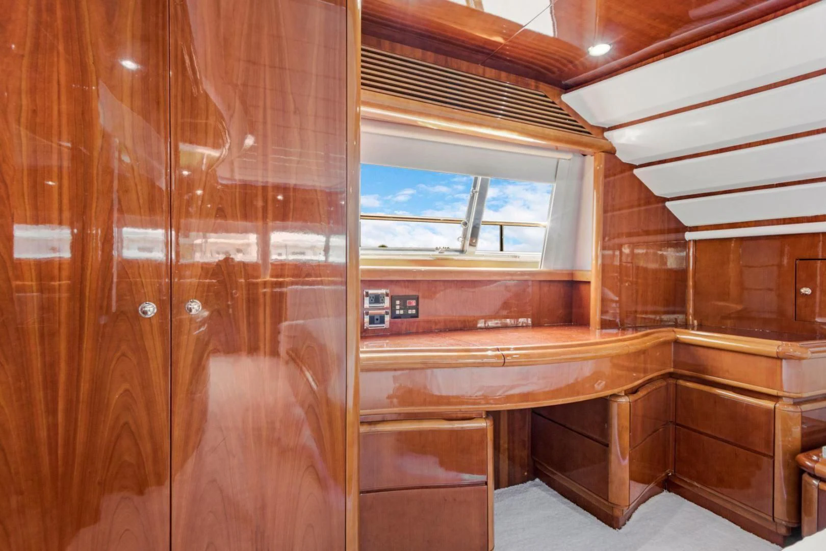 a wooden cabin with a window aboard SINPATICO Yacht for Sale