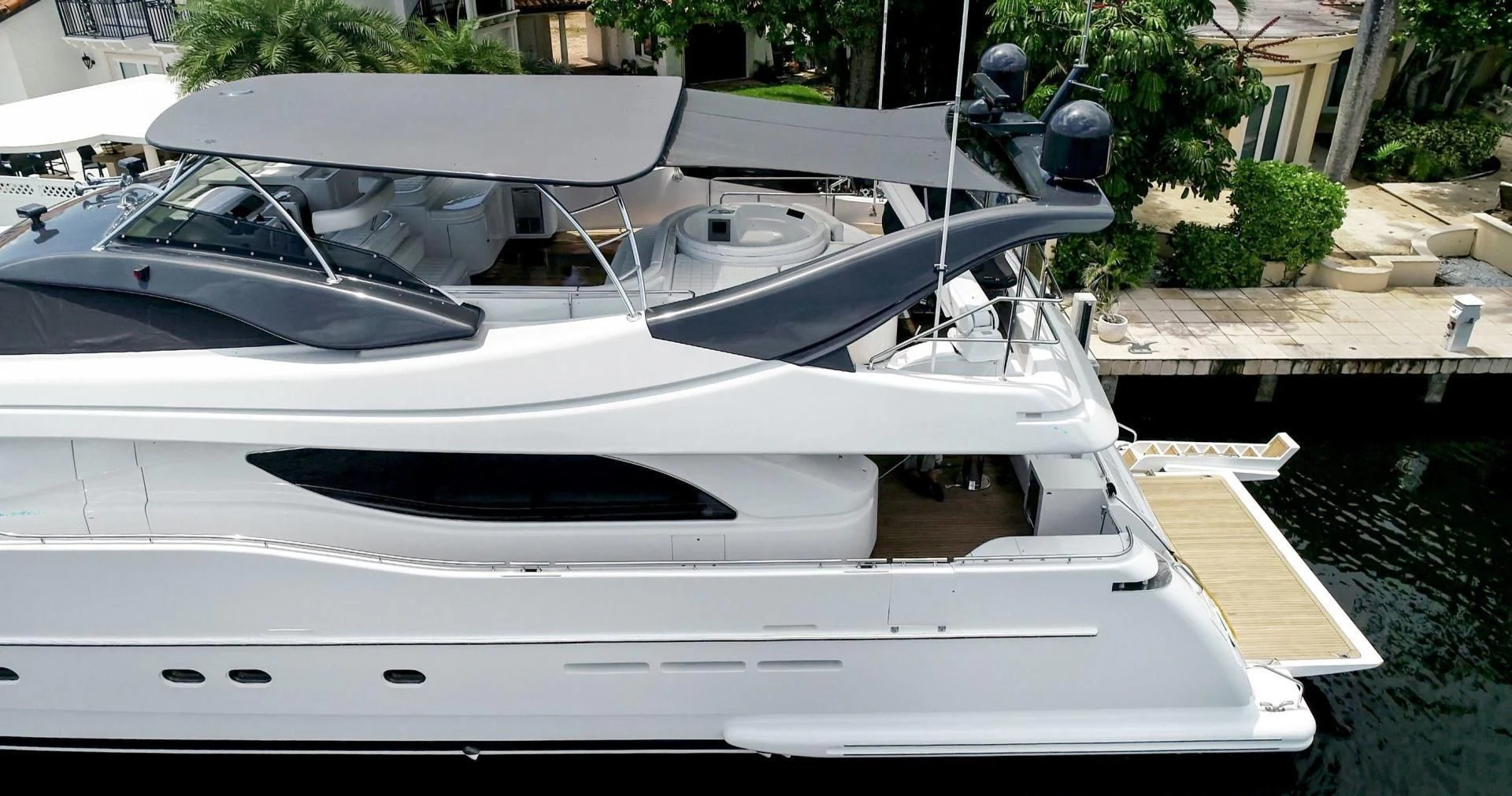 a white car parked on a driveway aboard SINPATICO Yacht for Sale