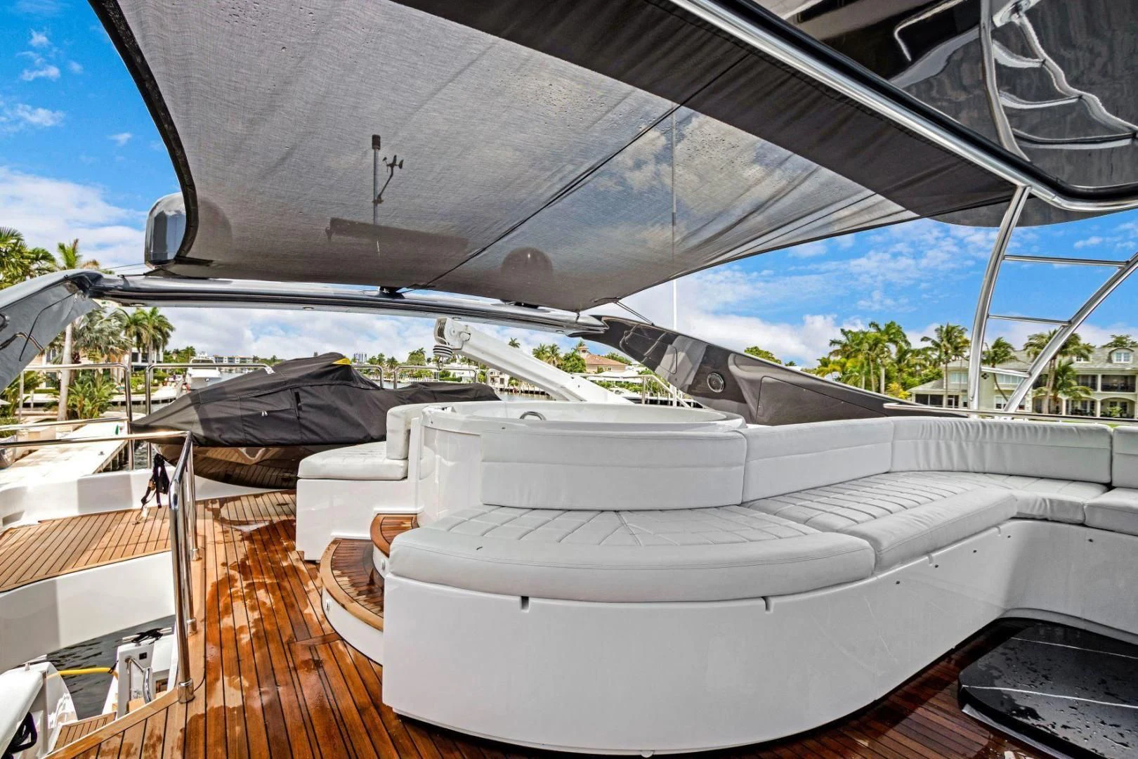a large white boat with a roof aboard SINPATICO Yacht for Sale