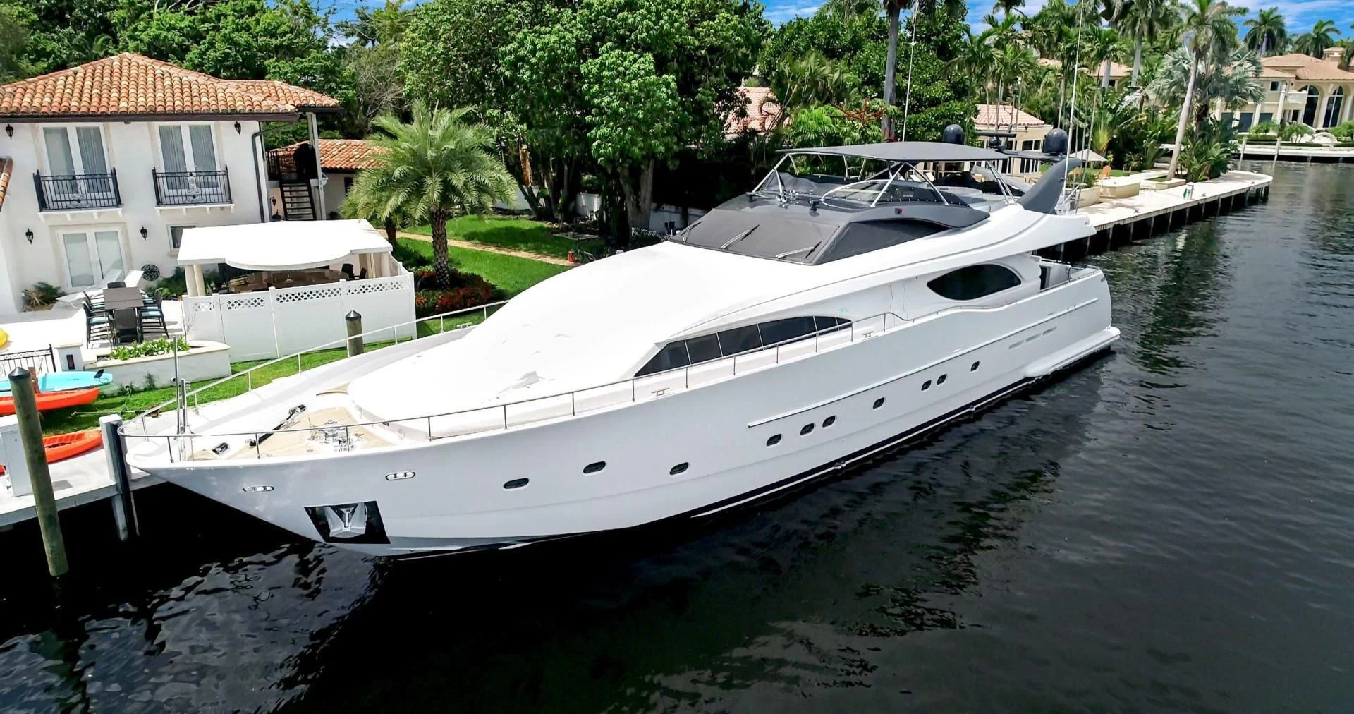 a boat docked at a pier aboard SINPATICO Yacht for Sale