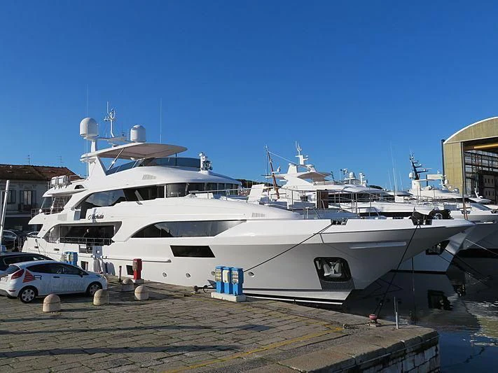 a couple of boats are parked in a dock aboard NECHIDA Yacht for Sale