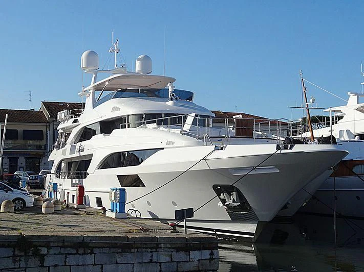 a large white boat aboard NECHIDA Yacht for Sale