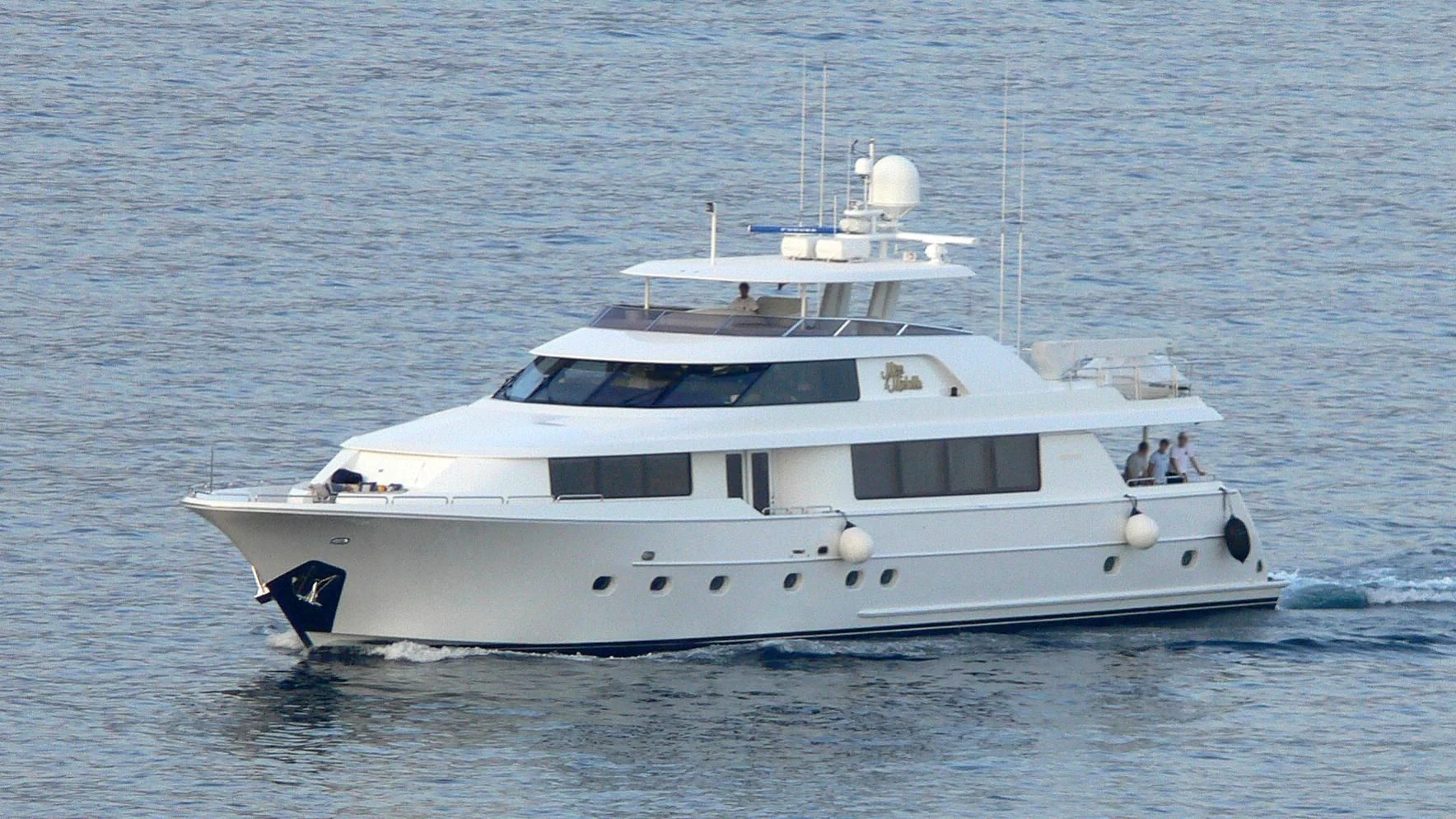 a white yacht in the water aboard UNWINED Yacht for Charter