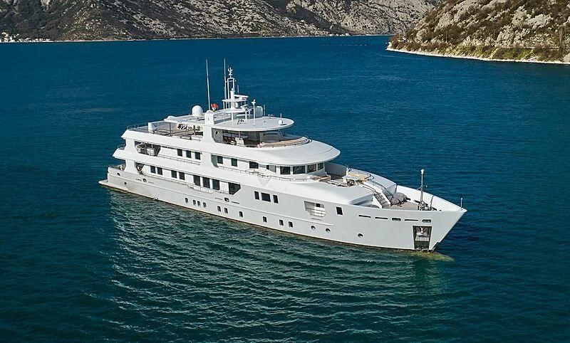a white yacht in the water aboard VERA Yacht for Sale