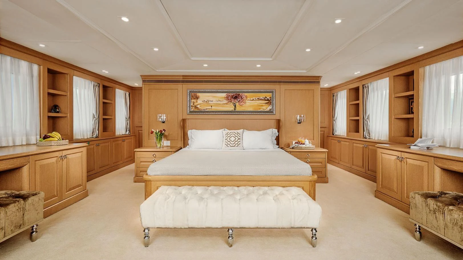 a large bedroom with a bed aboard VERA Yacht for Sale
