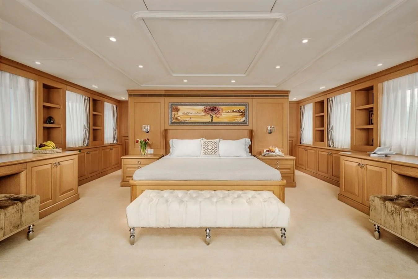 a large bedroom with a bed aboard VERA Yacht for Sale