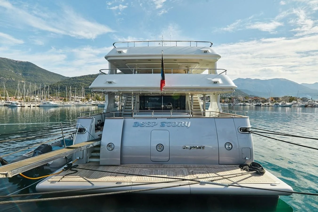 a boat docked at a pier aboard VERA Yacht for Sale