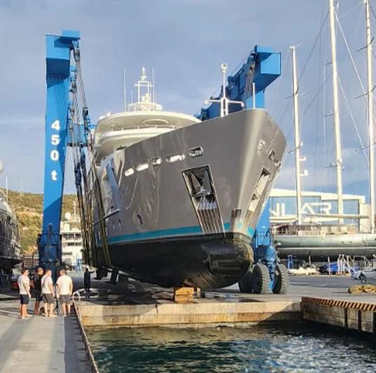a large ship docked aboard VERA Yacht for Sale