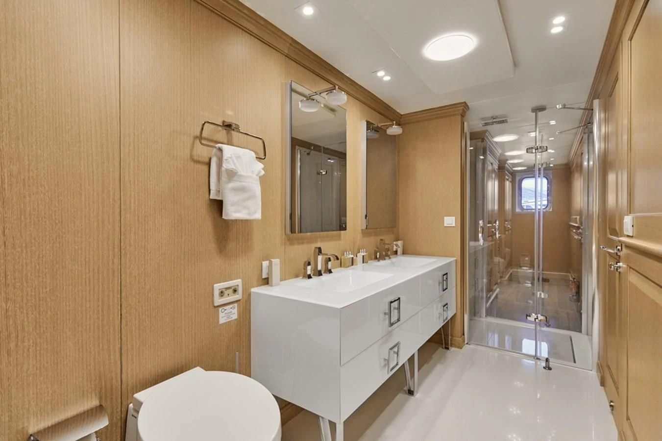 a bathroom with a glass shower aboard VERA Yacht for Sale