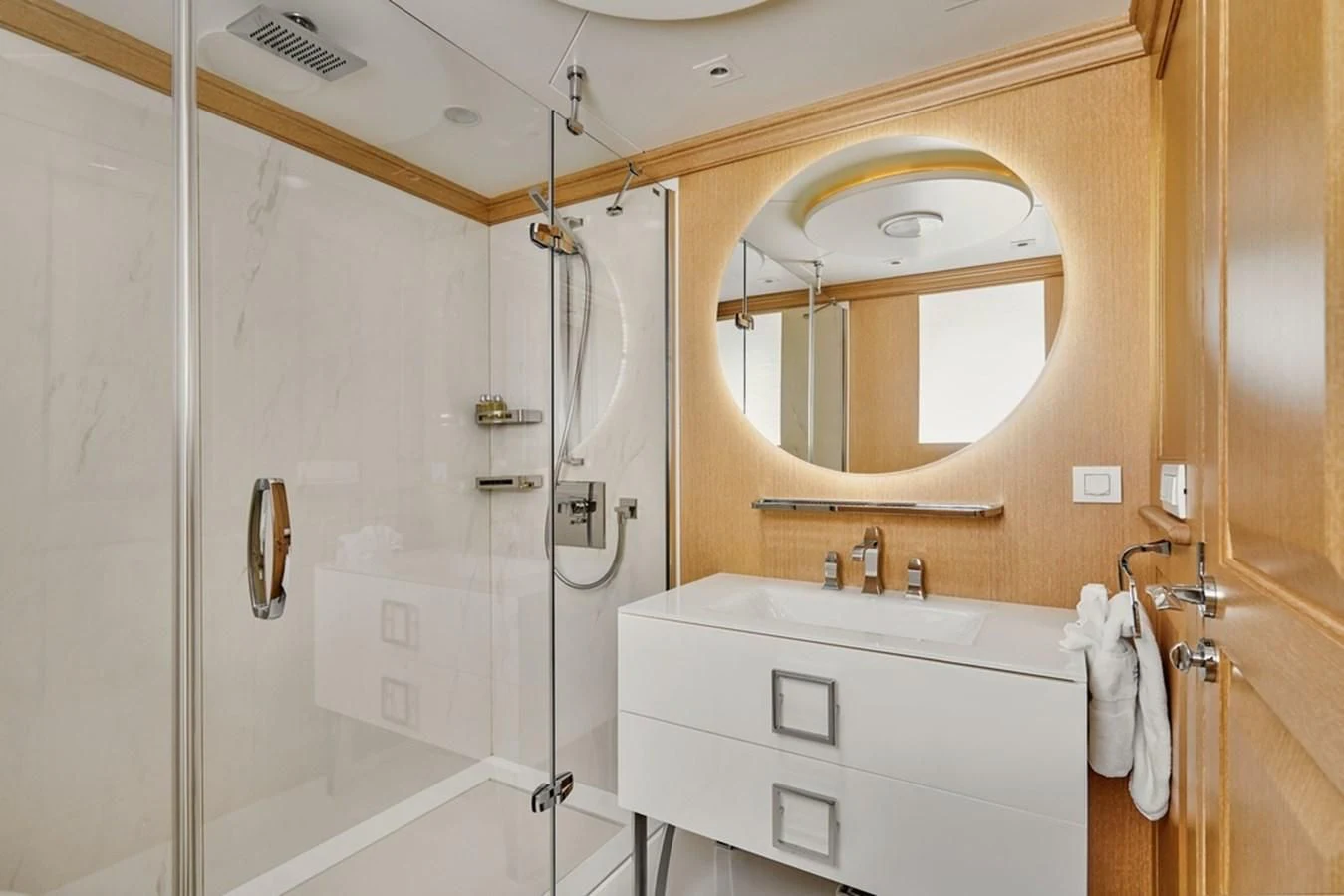 a bathroom with a large mirror aboard VERA Yacht for Sale