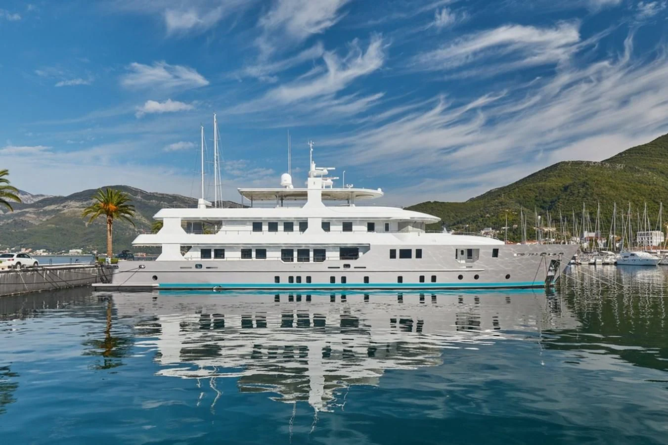 a large white boat in a body of water aboard VERA Yacht for Sale