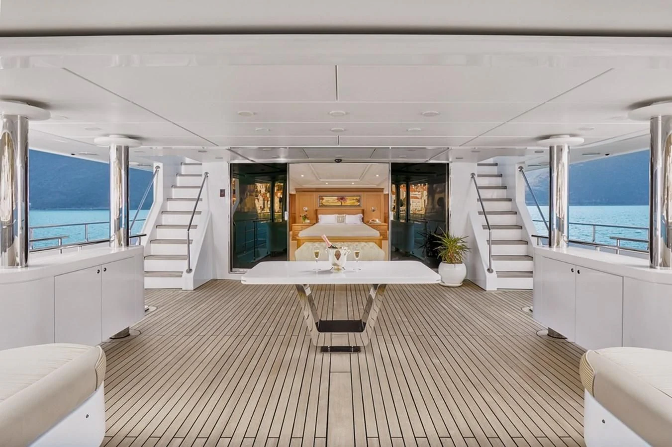 a room with a table and chairs aboard VERA Yacht for Sale