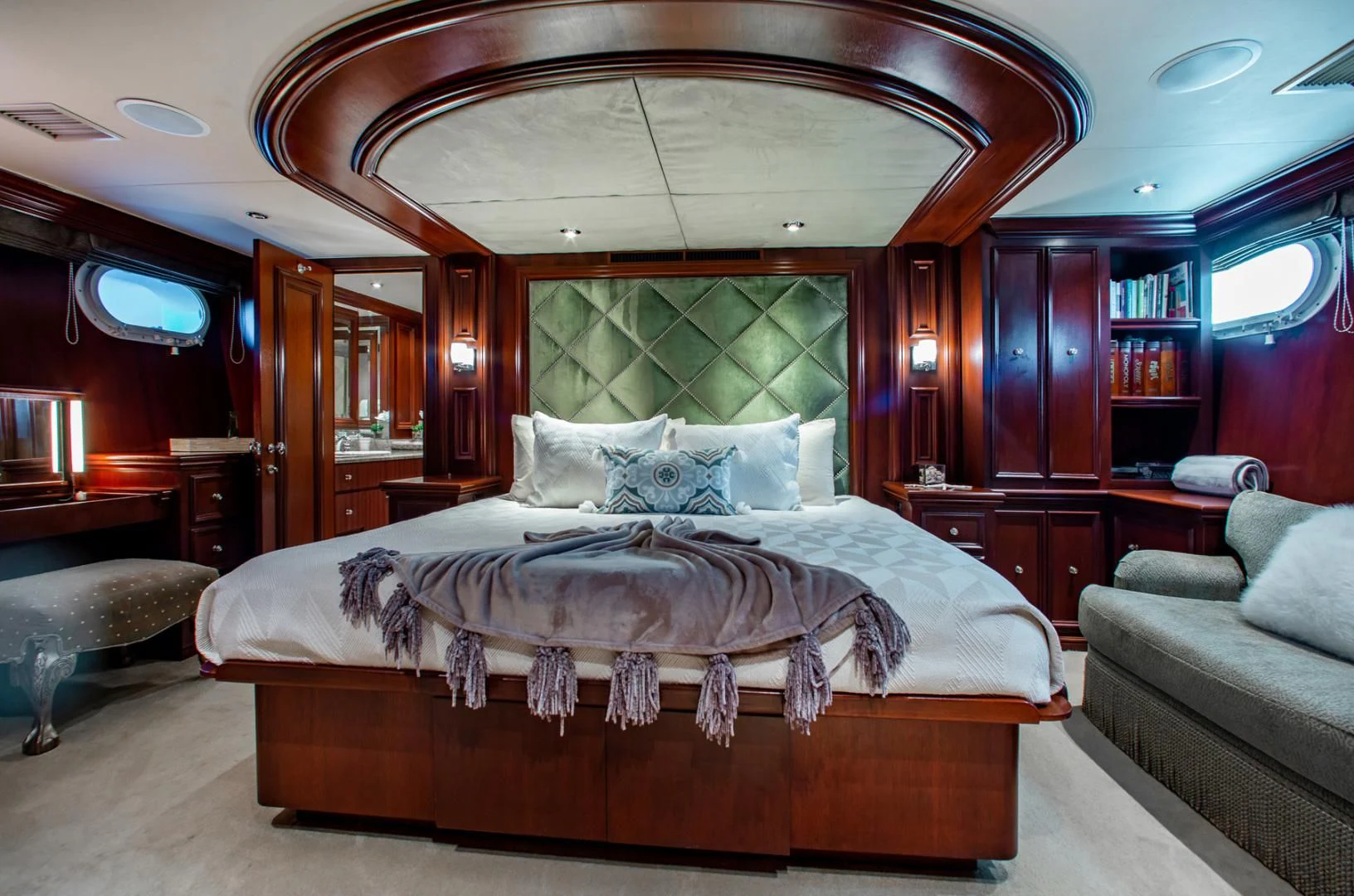 a bed in a room aboard THREE KINGS Yacht for Sale