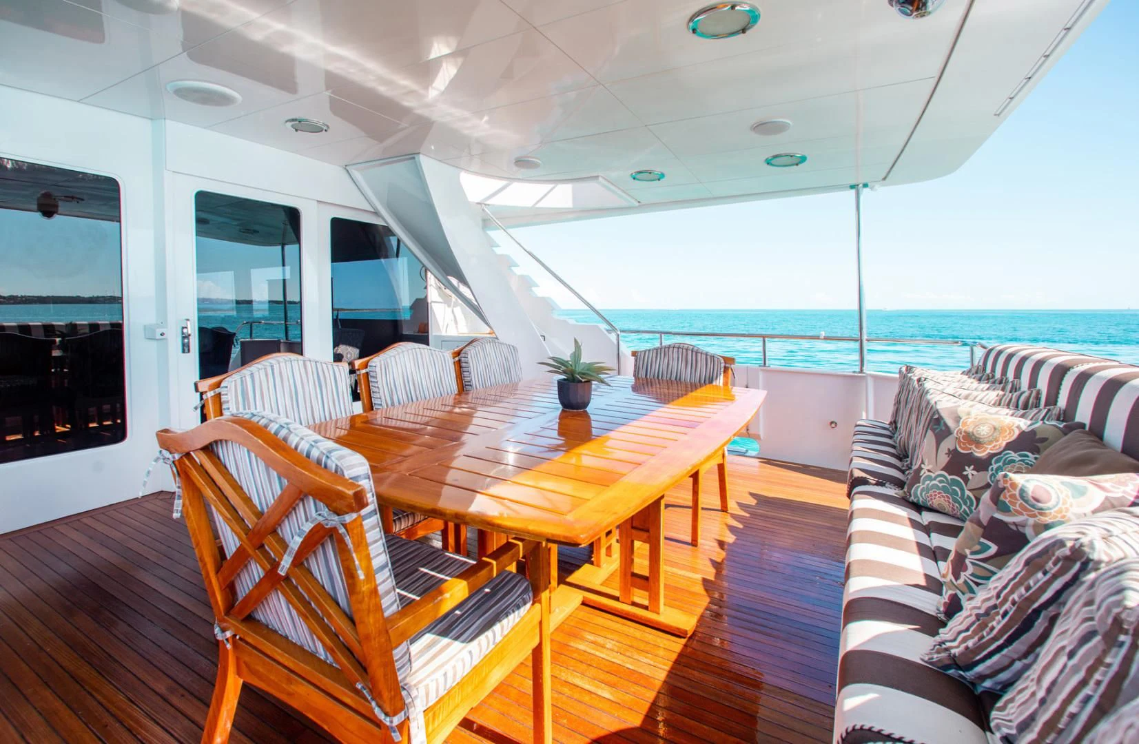 a dining table on a boat aboard THREE KINGS Yacht for Sale