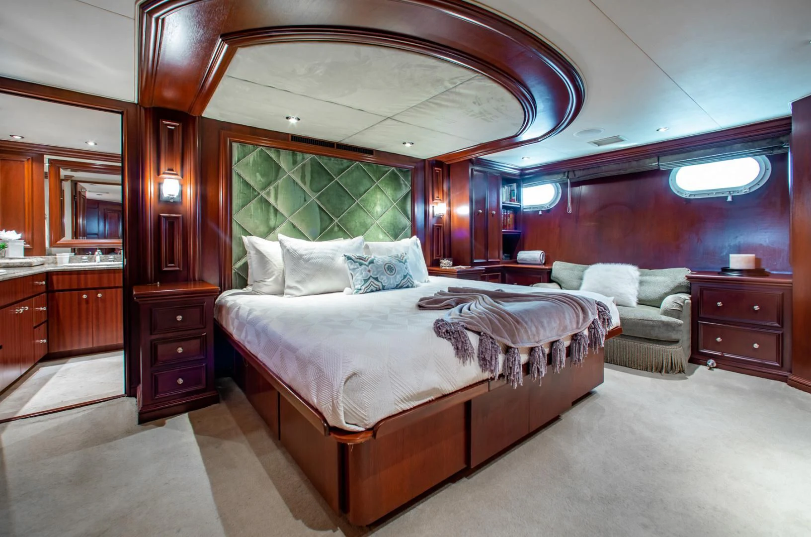 a large bedroom with a large bed aboard THREE KINGS Yacht for Sale
