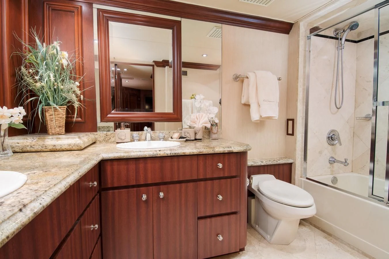 a bathroom with a large mirror aboard THREE KINGS Yacht for Sale
