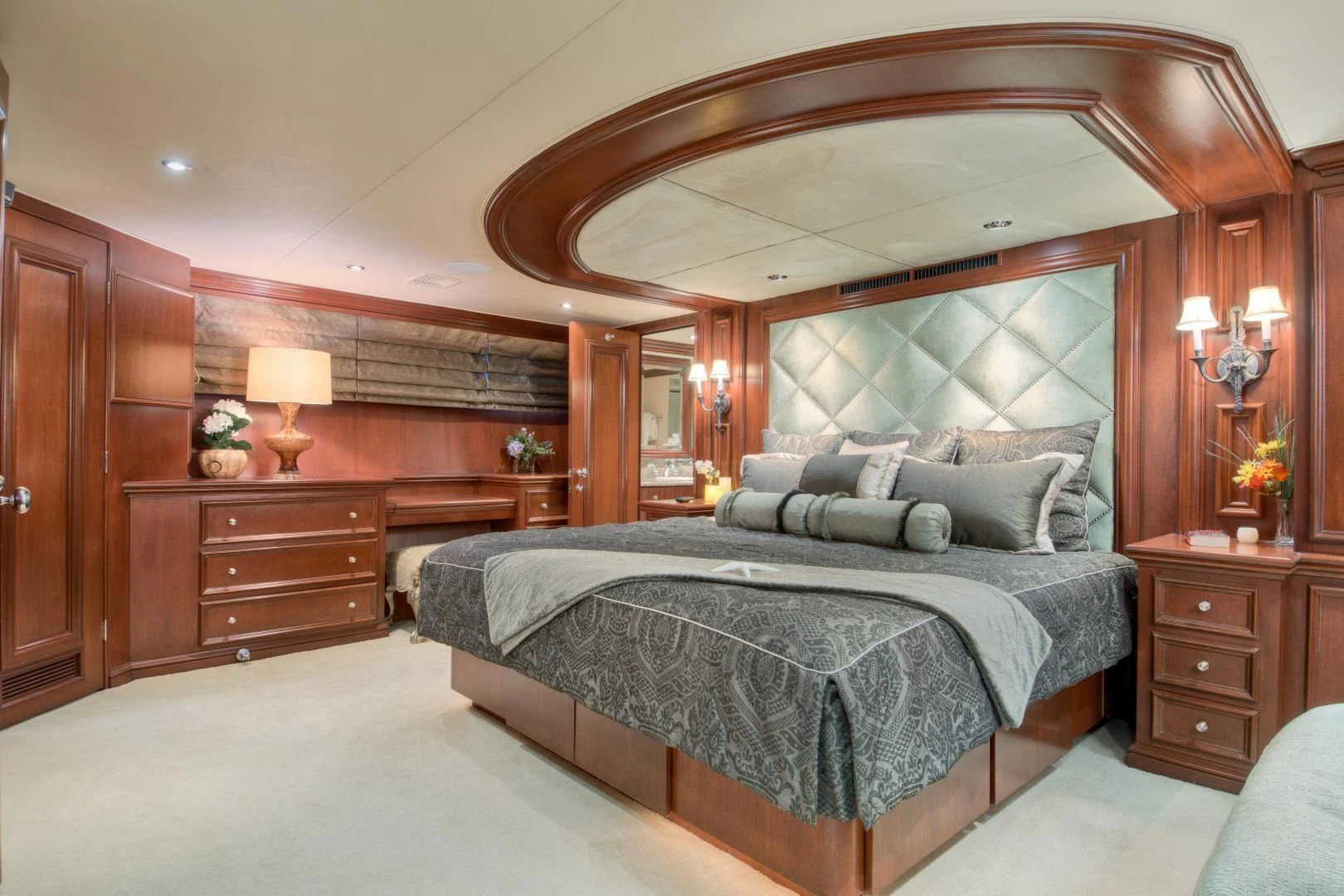a large bed in a room aboard THREE KINGS Yacht for Sale