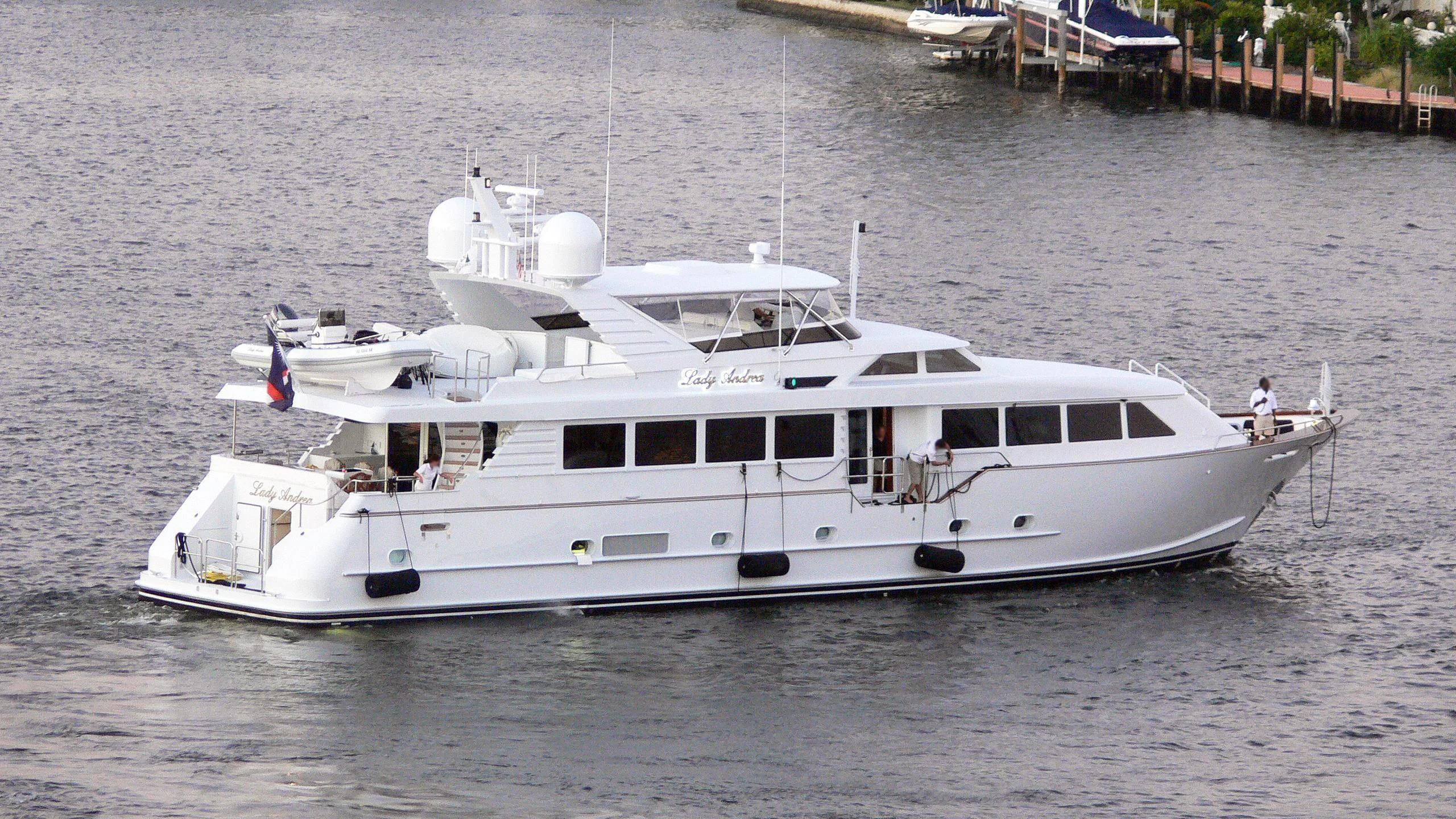 a white boat on the water aboard THREE KINGS Yacht for Sale