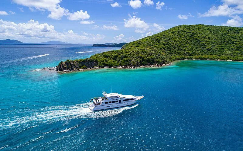 a boat sailing on the sea aboard THREE KINGS Yacht for Sale