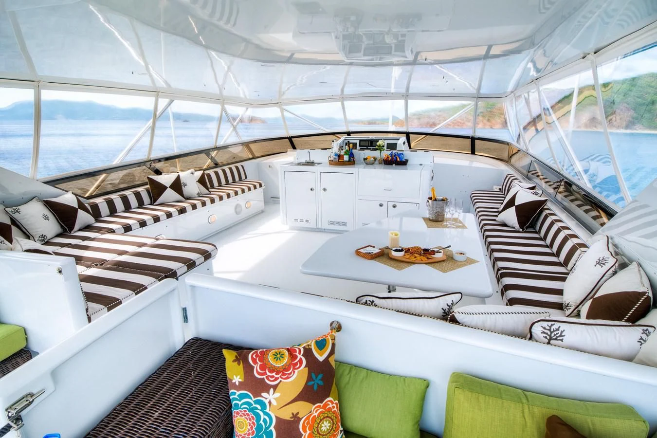 a room with a bed and a table aboard THREE KINGS Yacht for Sale