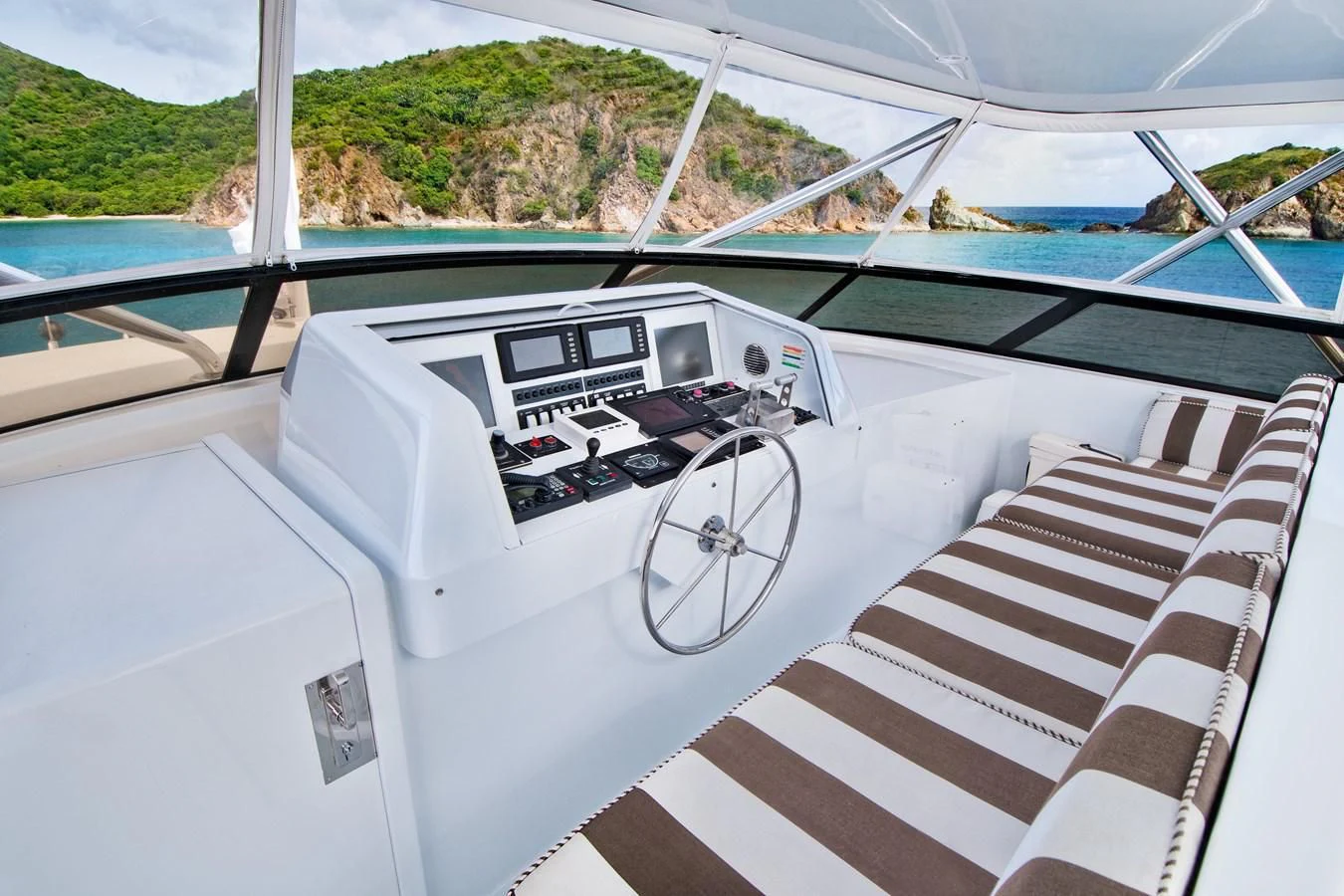 a white car with a fan on the roof aboard THREE KINGS Yacht for Sale