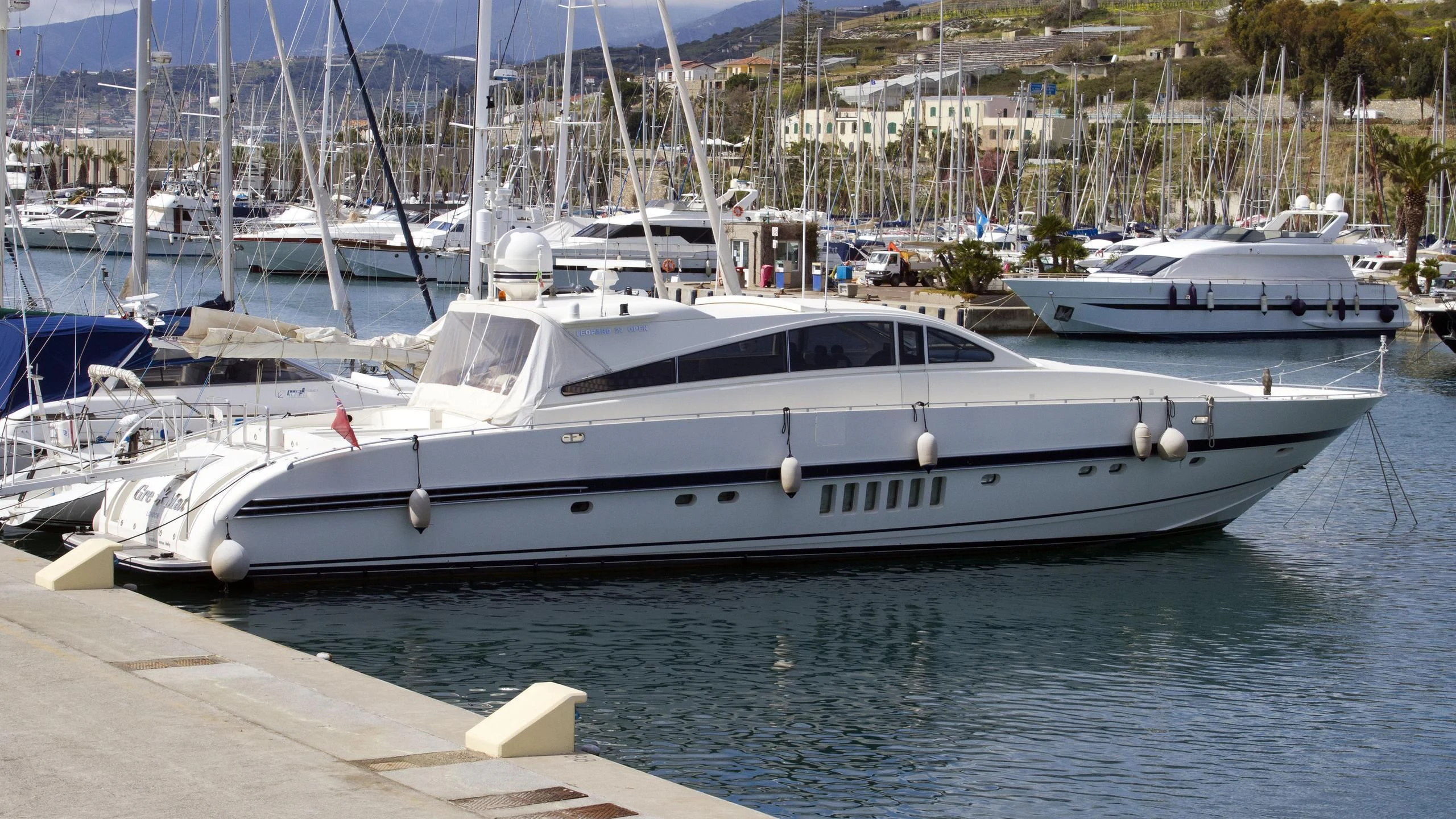 a boat docked at a pier aboard GREMAT Yacht for Sale
