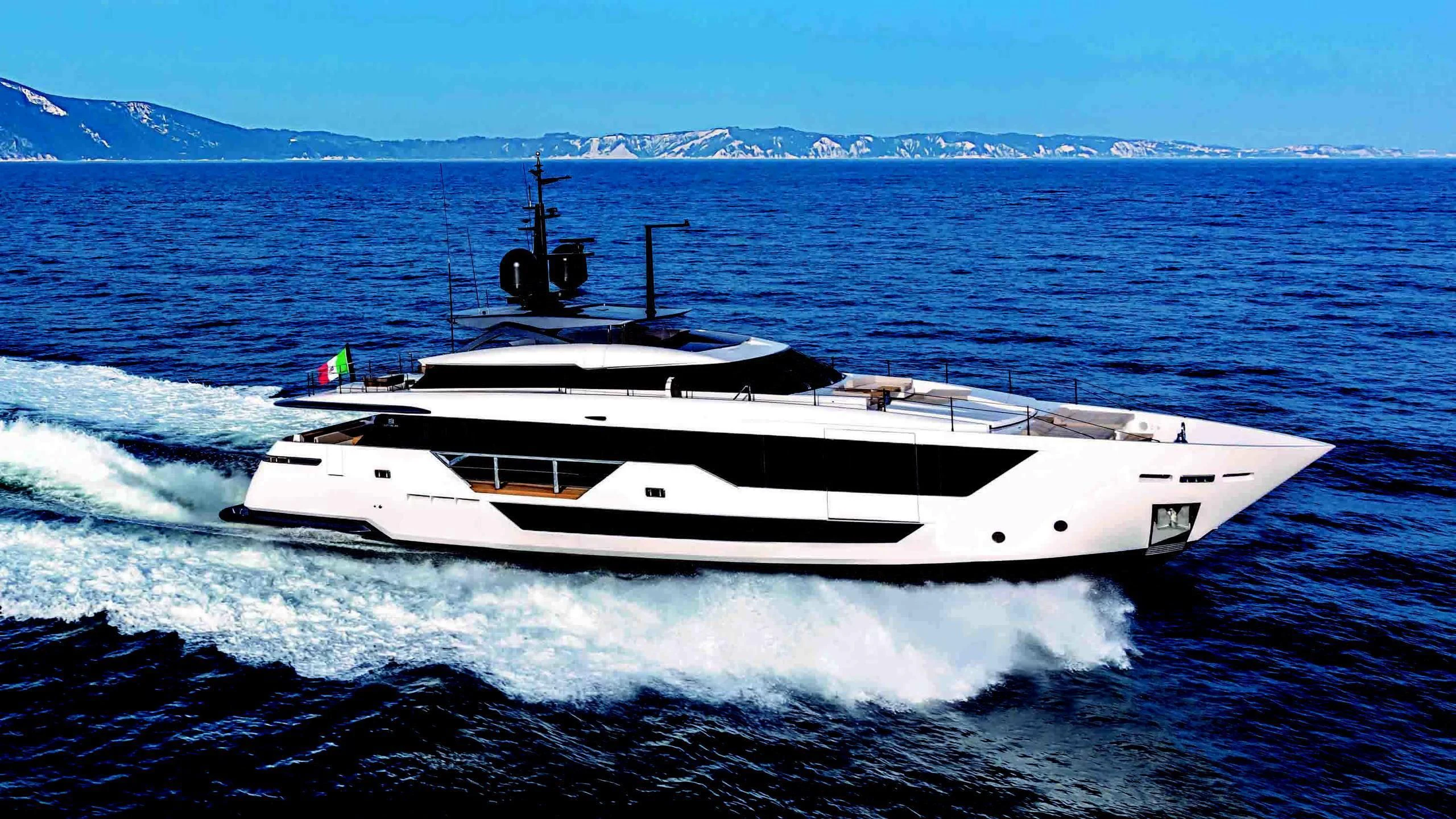a white yacht on the water aboard FUNNY Yacht for Sale