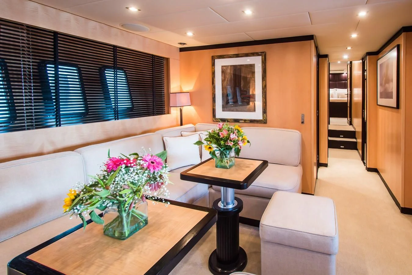 a living room with a couch and a coffee table aboard LEOPARD 24M Yacht for Sale
