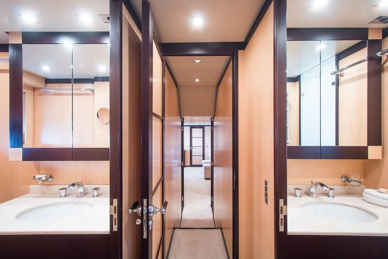 a bathroom with a sink and a mirror aboard LEOPARD 24M Yacht for Sale