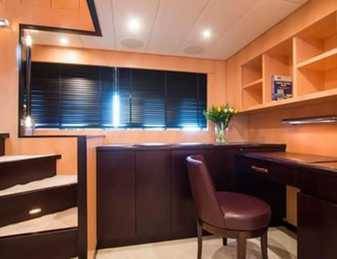 a room with a chair and a desk aboard LEOPARD 24M Yacht for Sale