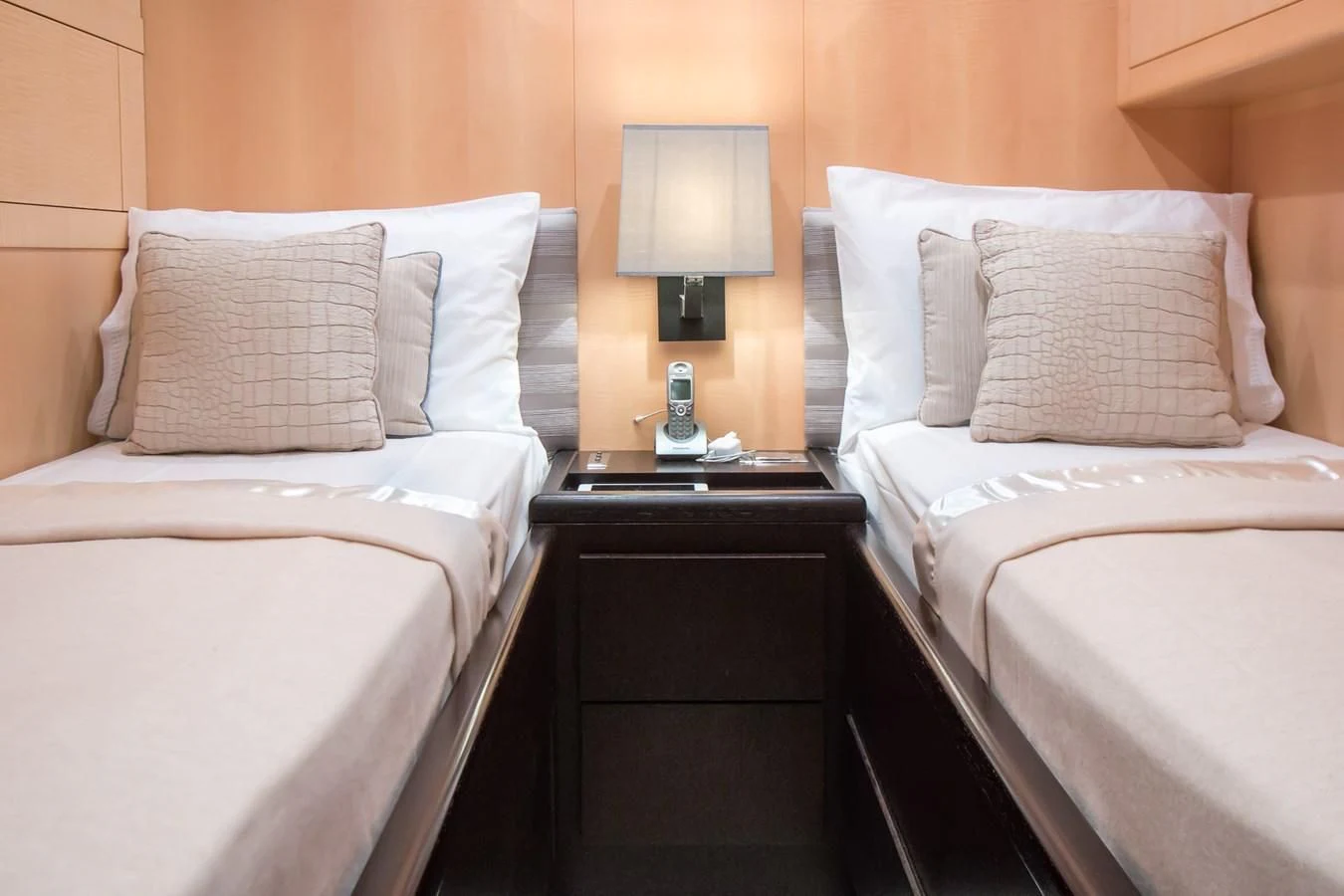 a couple of beds in a hotel room aboard LEOPARD 24M Yacht for Sale