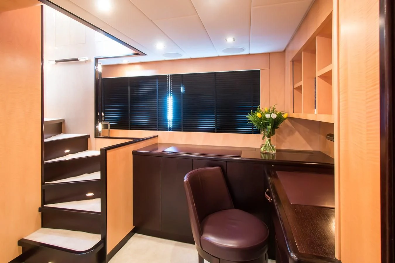 a room with a desk and a chair aboard LEOPARD 24M Yacht for Sale