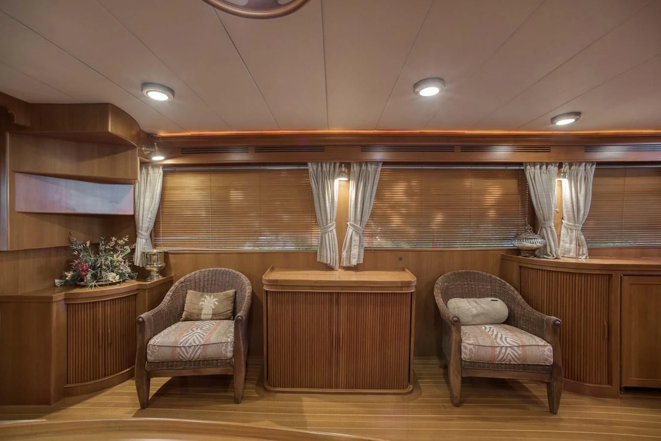 a room with a desk and chairs aboard BLUE ROSY V Yacht for Sale