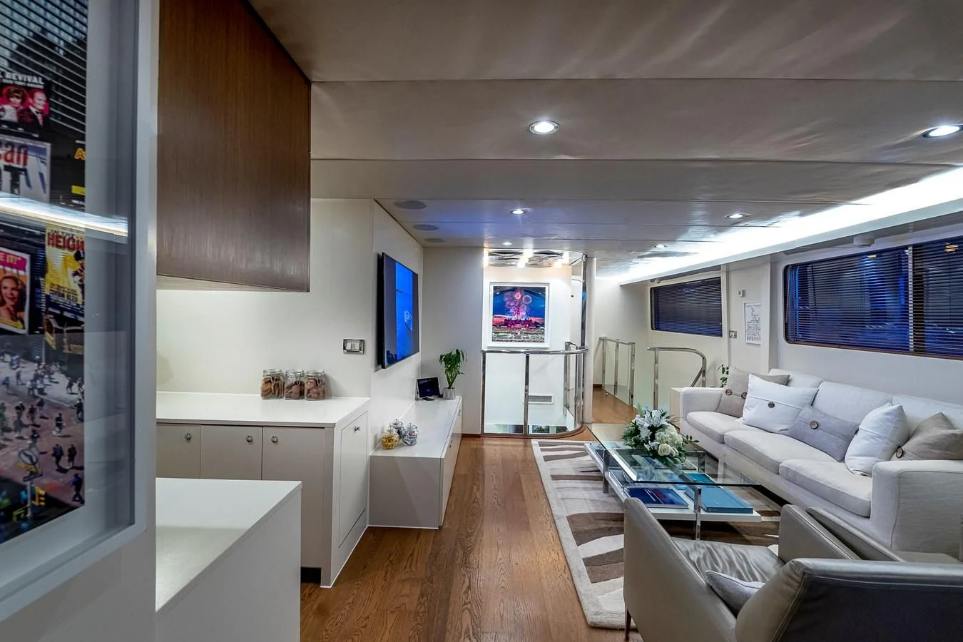 a living room with a wood floor aboard KARTAL YUVASI Yacht for Charter