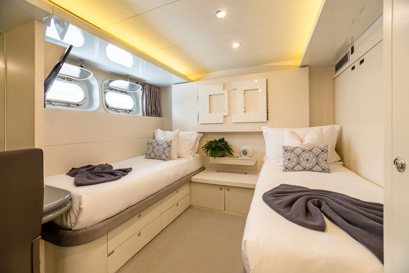 a bedroom with two beds aboard KARTAL YUVASI Yacht for Charter