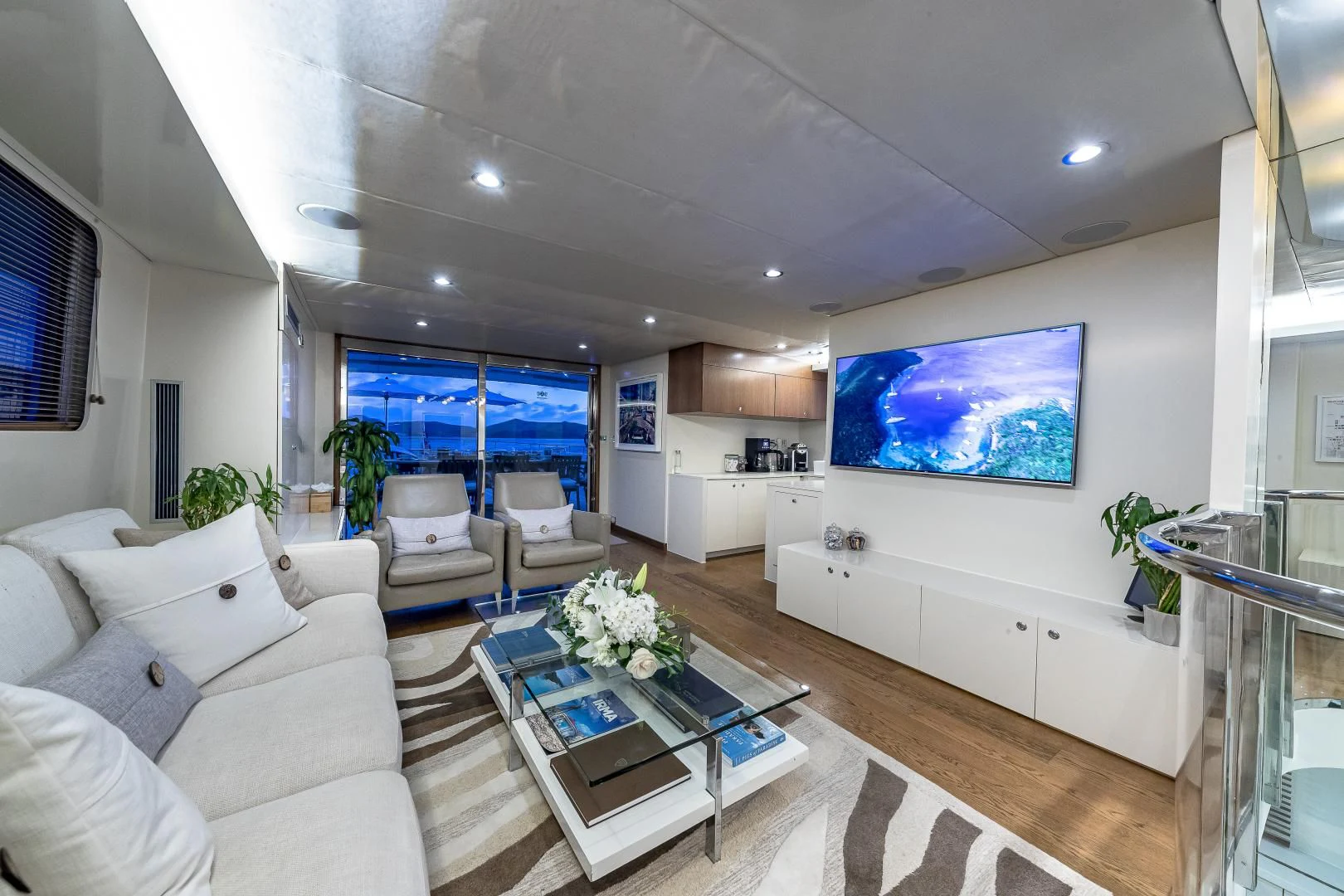 a living room with a large window aboard KARTAL YUVASI Yacht for Charter