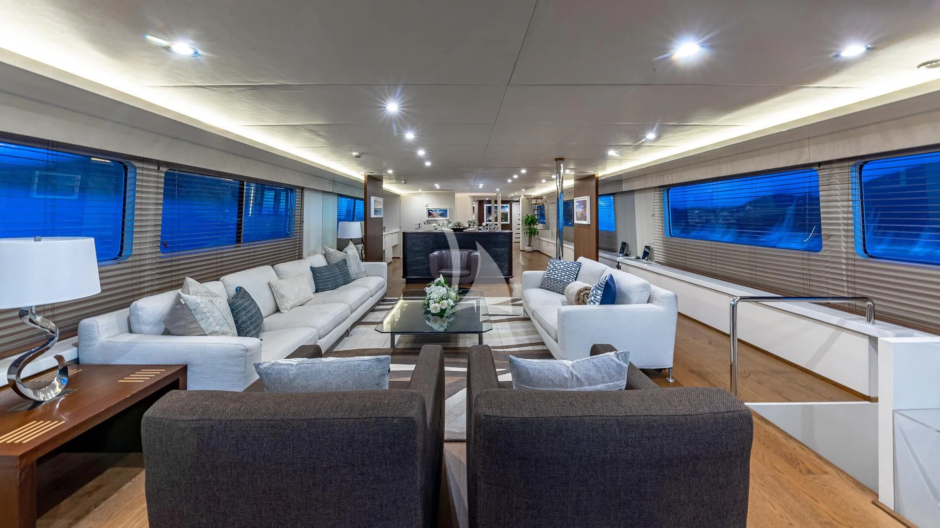 a living room with a large window aboard KARTAL YUVASI Yacht for Charter