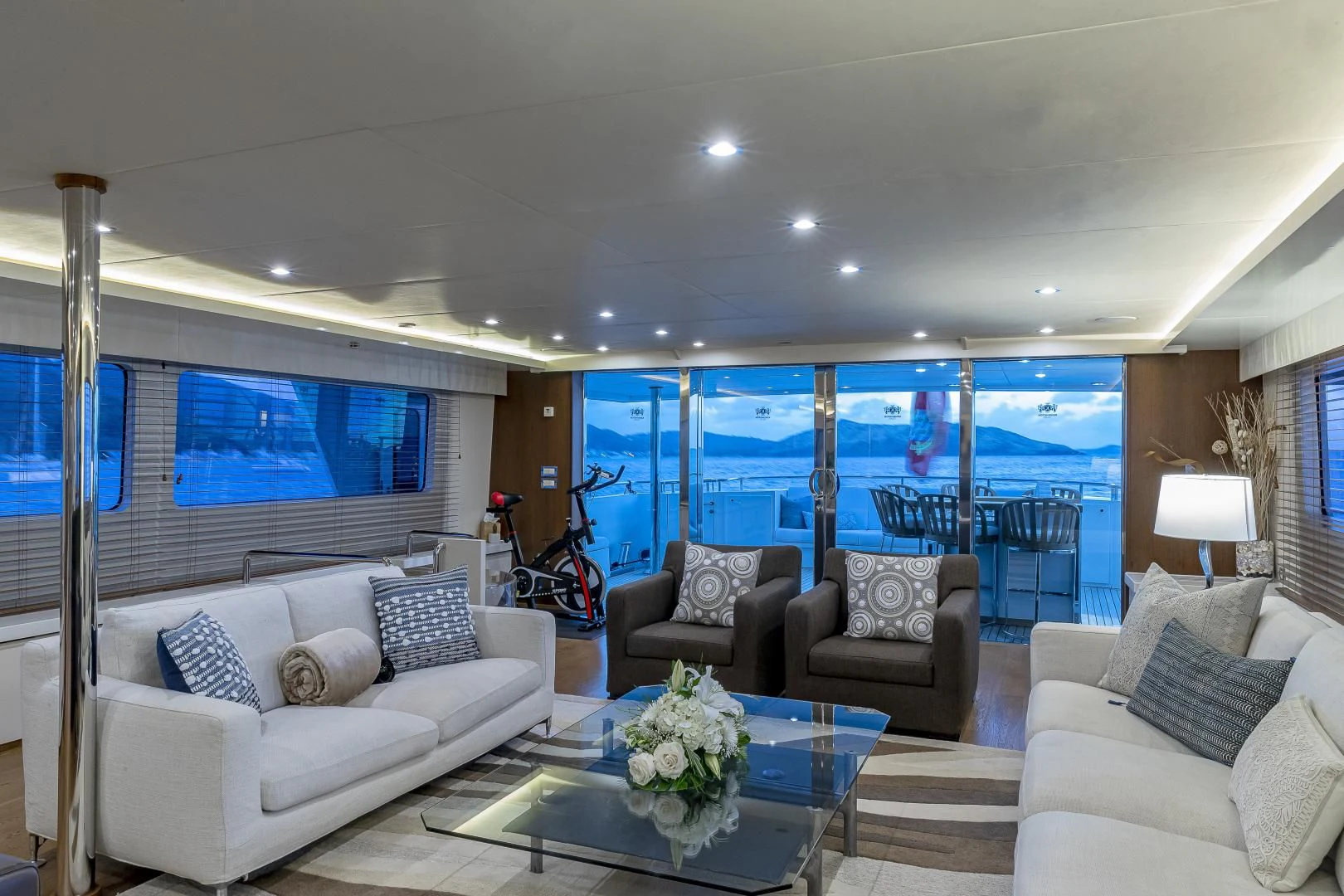 a living room with a large window aboard KARTAL YUVASI Yacht for Charter