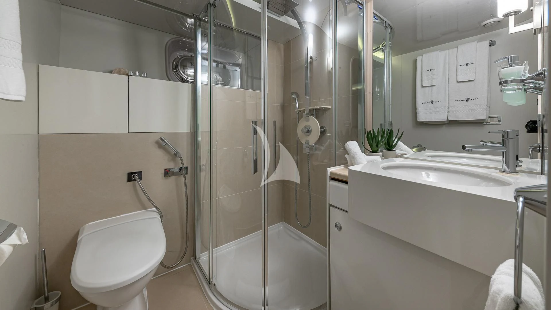 a bathroom with a shower and sink aboard KARTAL YUVASI Yacht for Charter