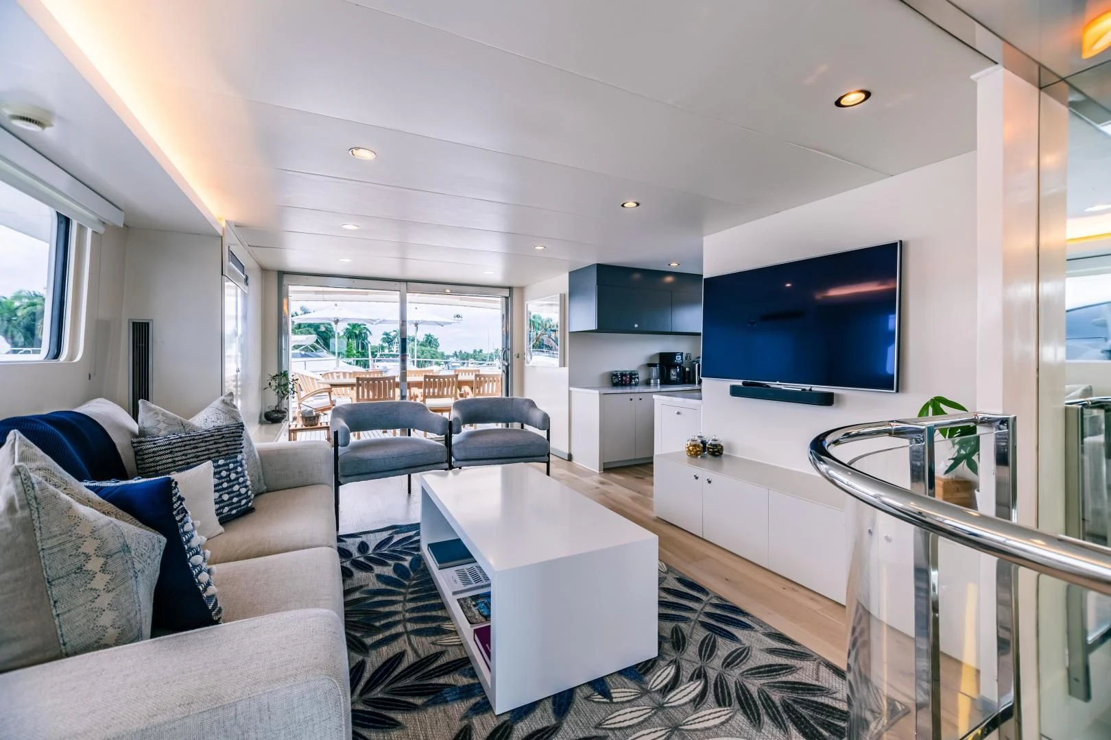 a living room with a table and chairs aboard KARTAL YUVASI Yacht for Charter