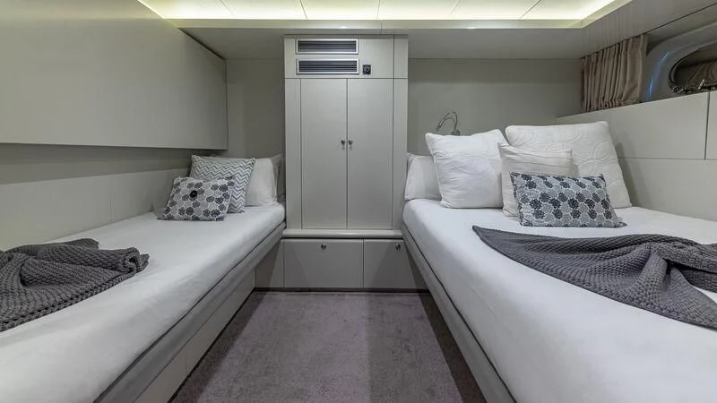 a couple of beds in a room aboard KARTAL YUVASI Yacht for Charter