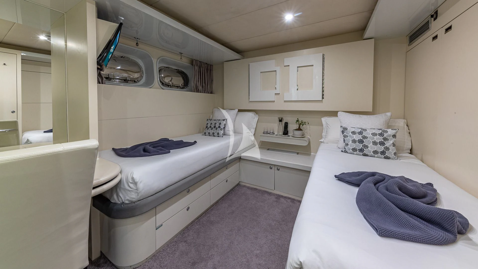 a room with two beds aboard KARTAL YUVASI Yacht for Charter