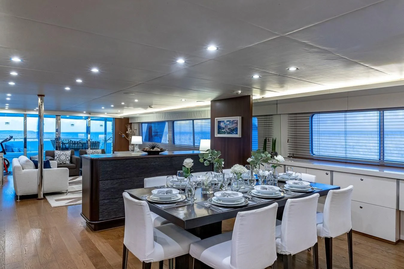 a dining room with a table and chairs aboard KARTAL YUVASI Yacht for Charter