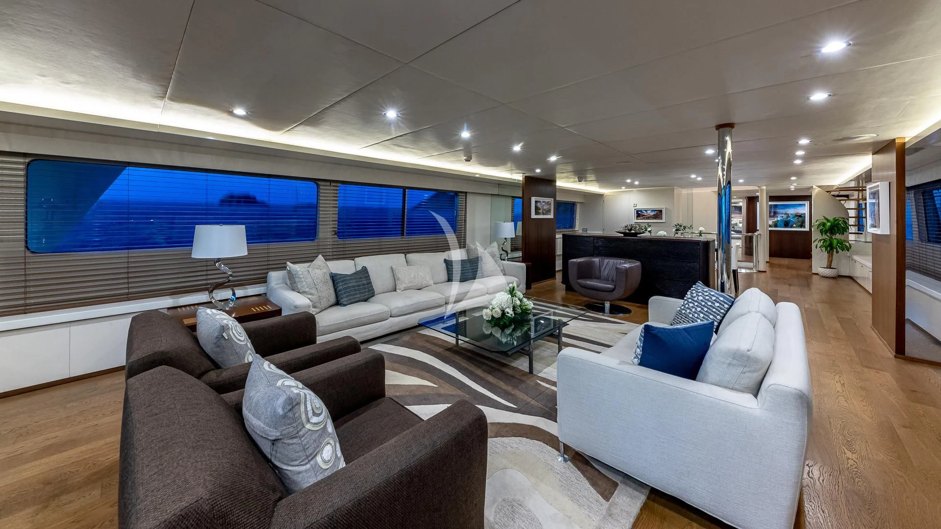 a living room with a large screen aboard KARTAL YUVASI Yacht for Charter