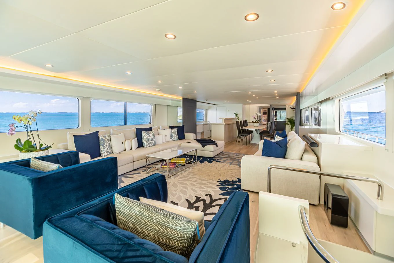 a living room with a large window aboard KARTAL YUVASI Yacht for Charter