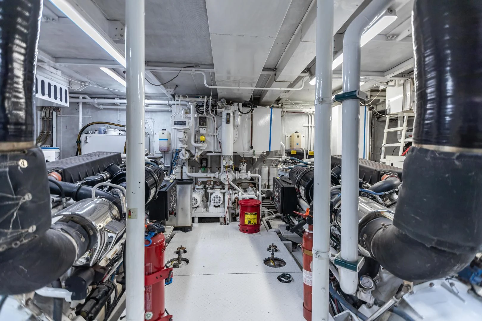 a large factory with large pipes aboard KARTAL YUVASI Yacht for Charter